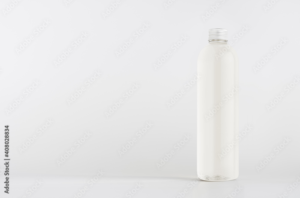 Transparent plastic tall thin bottle with water or cosmetic product, silver cap mockup on white background. Template for design. Transparent plastic tall thin bottle with water or cosmetic product, silver cap mockup on white background. Template for design.