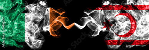 Republic of Ireland, Irish vs Northern Cyprus smoky mystic flags placed side by side. Thick colored silky abstract smoke flags.