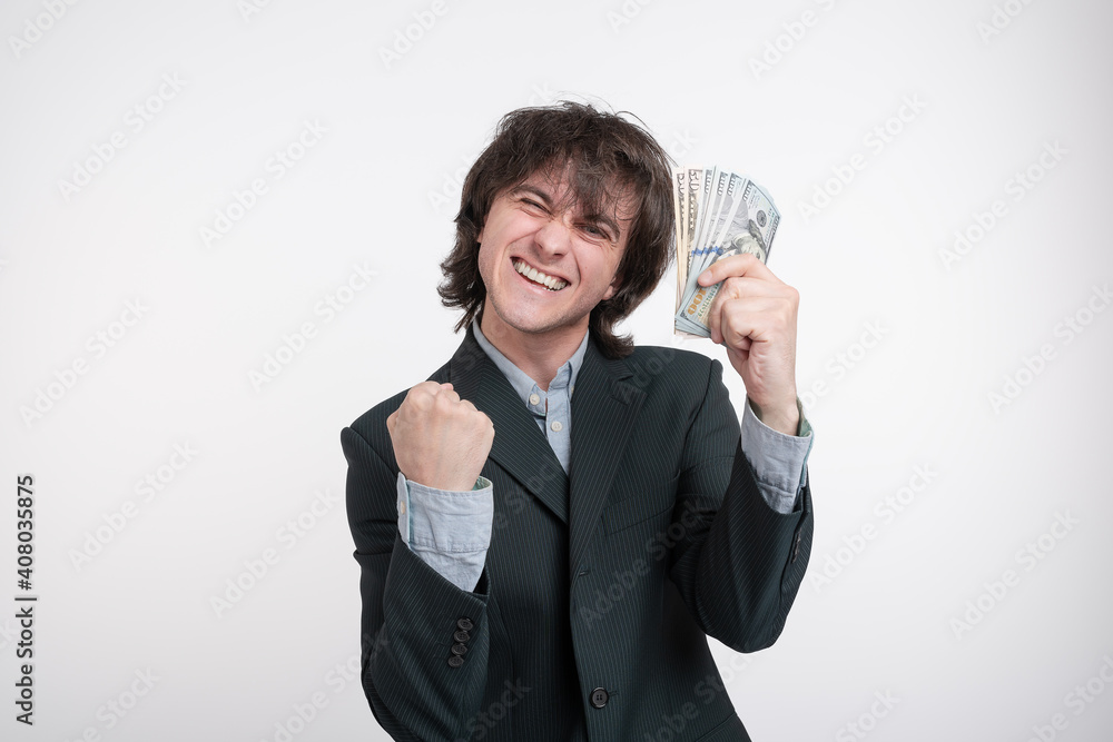 successful winner with his prize. Excited man with money stack successful winner with his prize. Excited man with money stack