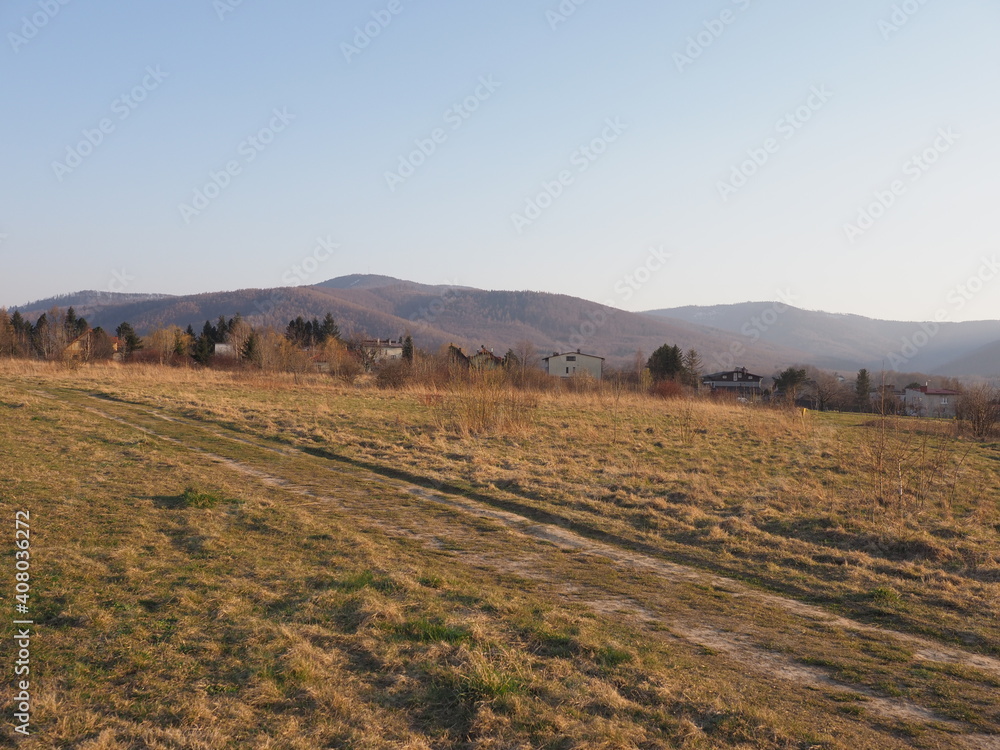Brilliant Silesian Beskid Mountains range in european Bielsko-Biala city at Silesian district in Poland, clear blue sky in 2020 warm sunny spring day on April.