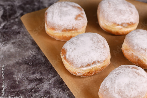 'Berliner Pfannkuchen', a traditional German donut like dessert filled with jam made from sweet yeast dough fried in fat