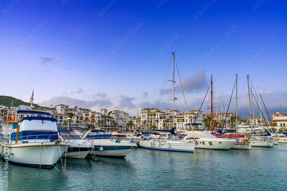 view of the marina and harbor at La Duquesa in Andalusia at sunset