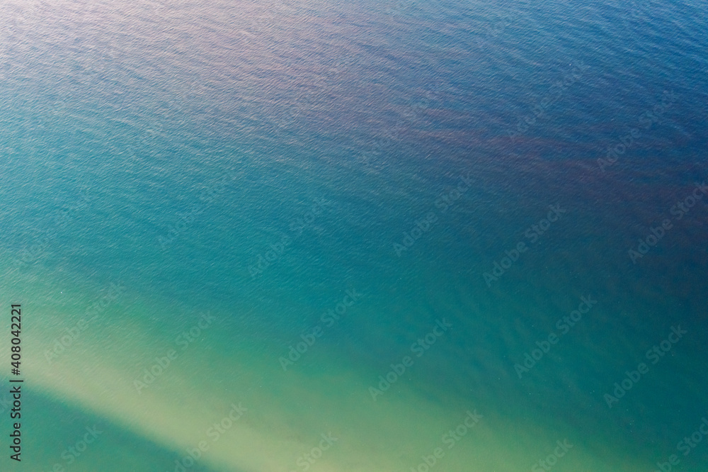 Top diagonal view of sea water. Abstract nature landscape background Top diagonal view of sea water. Abstract nature landscape background