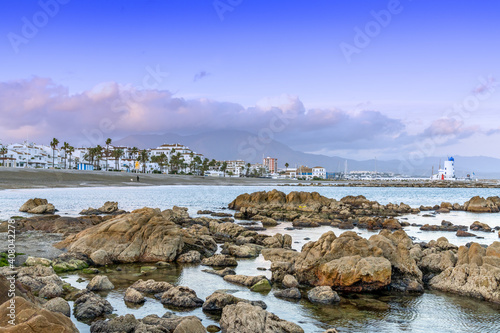 view of the beach and harbor at La Duquesa in Andalusia