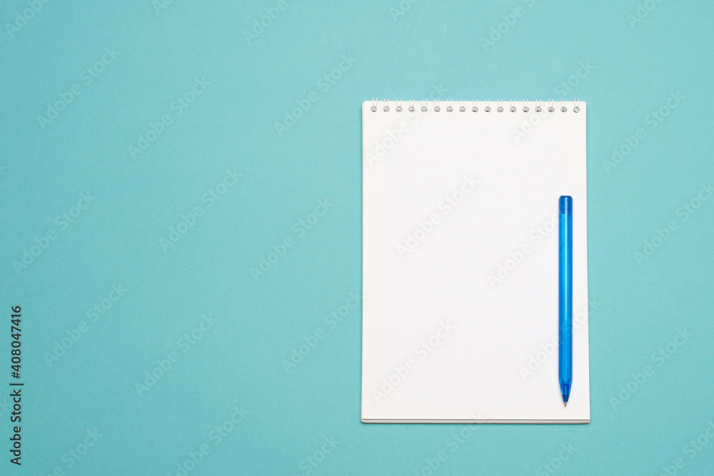 White paper letter and pen on colorful background White paper letter and pen on colorful background