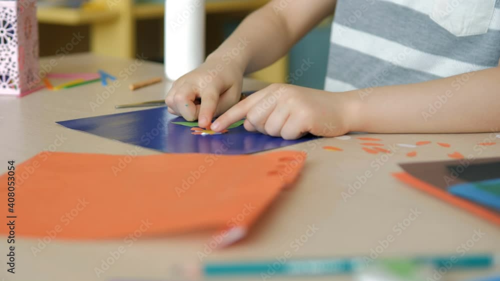 A school-age boy does homework at home. Training at school A school-age boy does homework at home. Training at school