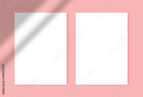 Two white blank A4 papers with shadows on the pink background. Templates for presentation of design like flyer, cover, poster. mock up design template