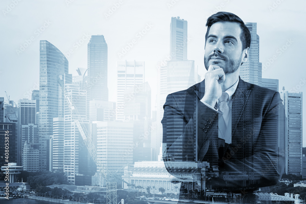 Young handsome businessman in suit with hand on chin thinking how to succeed, new career opportunities, MBA. Singapore on background. Double exposure. Young handsome businessman in suit with hand on chin thinking how to succeed, new career opportunities, MBA. Singapore on background. Double exposure.