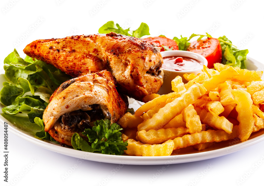 Stuffed chicken fillets, French fries and fresh vegetables
on white background Stuffed chicken fillets, French fries and fresh vegetables
on white background