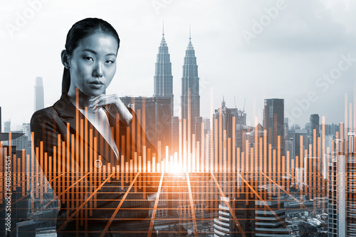 Photography Attractive young Asian trader and stock market analyst in suit dreaming about market behavior and forecast in crisis