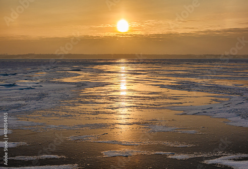 Wallpaper Mural sunset over the frozen sea with reflection in ice Torontodigital.ca