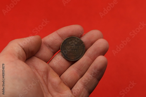 Vintage russian copper coin damaged by time