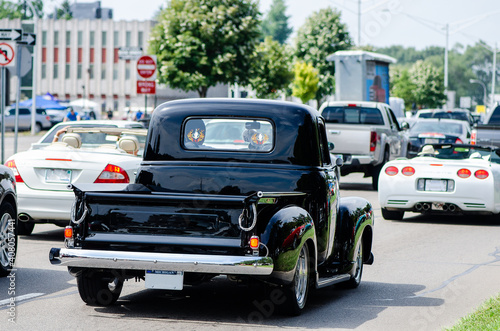 Vintage Pickup on traffic jam - Muscle car among newer cars