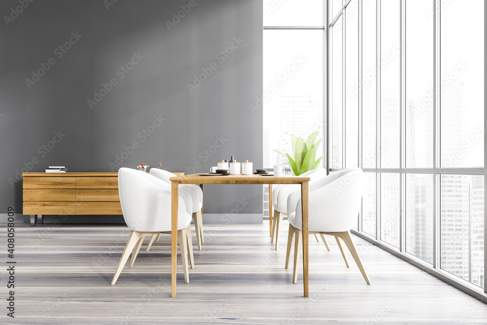 Grey dining room with wooden furniture and commode near window - obrazy, fototapety, plakaty 