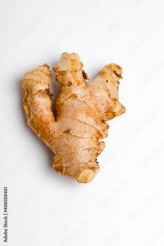 Fresh ginger on white background, herb medical concept Fresh ginger on white background, herb medical concept