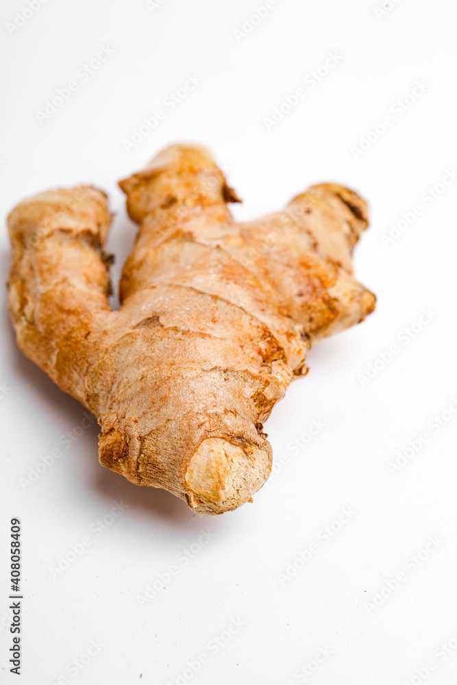 Fresh ginger on white background, herb medical concept Fresh ginger on white background, herb medical concept