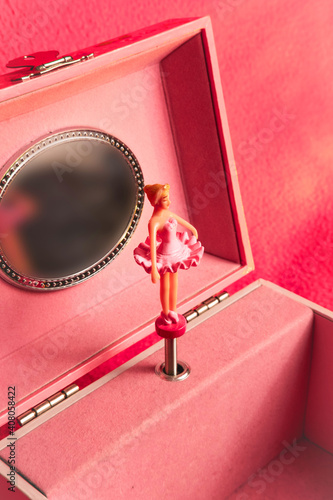 Rose music Box with little sweet ballerina on the pink background