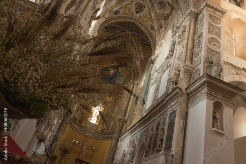 Cefalù, Sicilian tourist destination. Medieval Sicily. Duomo and views of the streets. Votive shrines, Saints and Madonnas. Details of Sicily. photo