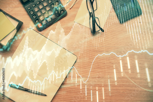 Double exposure of forex graph drawing and work table top veiw. Concept of financial analysis.