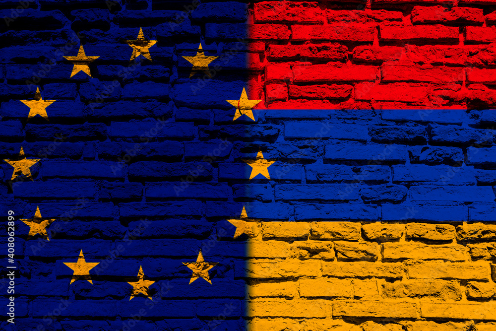 Flag of Europe and Armenia on the brick wall