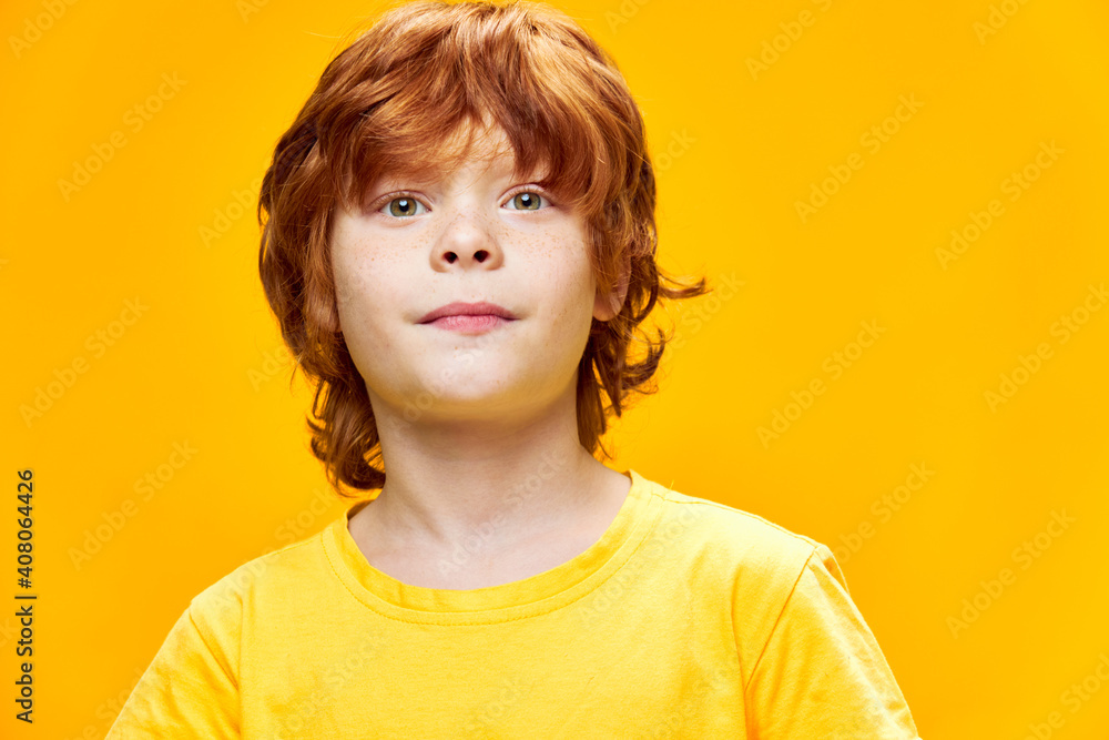 Red-haired boy cropped view close-up studio Red-haired boy cropped view close-up studio