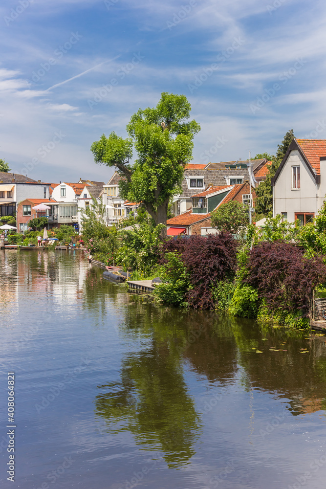 Houses at the river Vlist in Haastrecht, Netherlands