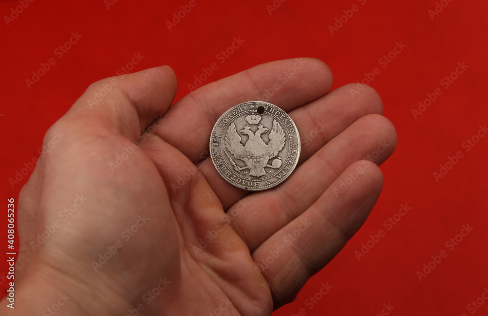 old polish silver coin in hand old polish silver coin in hand