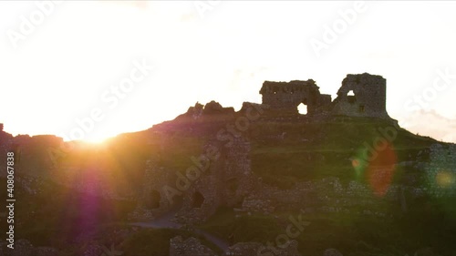 Aerial shot rising up above Rock of Dunamase at sunset.  photo