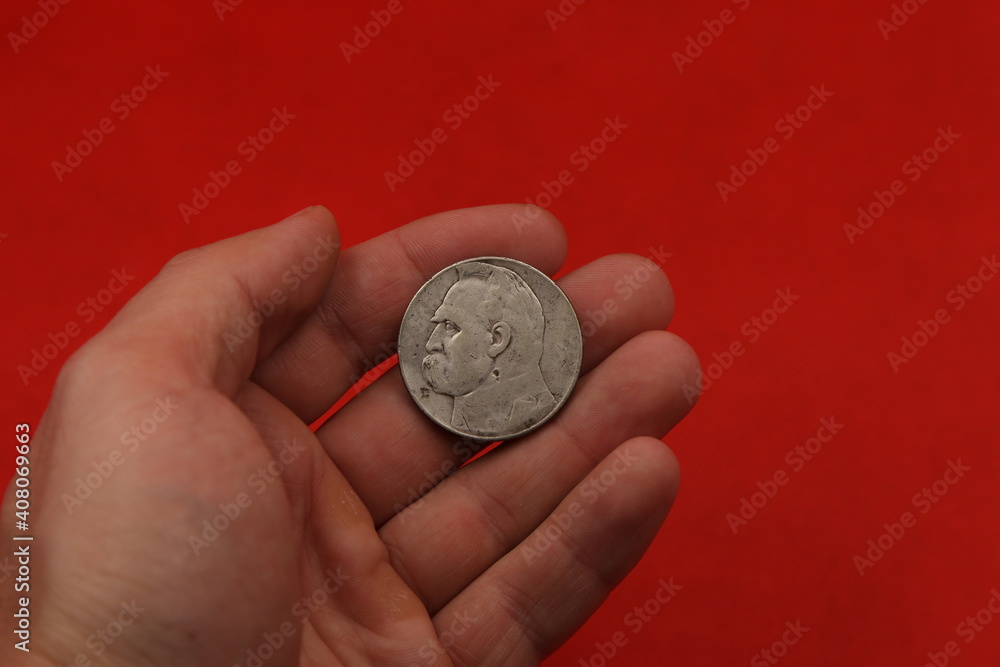 old polish silver coin in hand old polish silver coin in hand