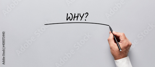 Tableau sur toile Businessman hand writing the question why on gray background