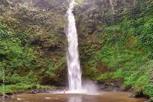 Air Terjun Nungnung waterfall. Bali  Indonesia. Travel concept