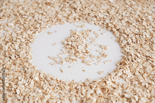 Wallpaper Mural Dry oatmeal scattered in the form of a circle on a white background. Copy, empty space for text Torontodigital.ca