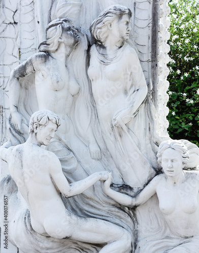 Three male and a female statue