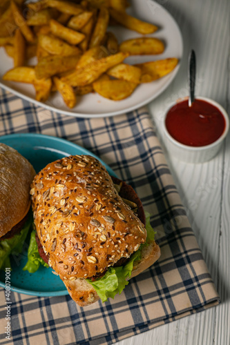 Ciabatta with vegan cutlet and greens. 