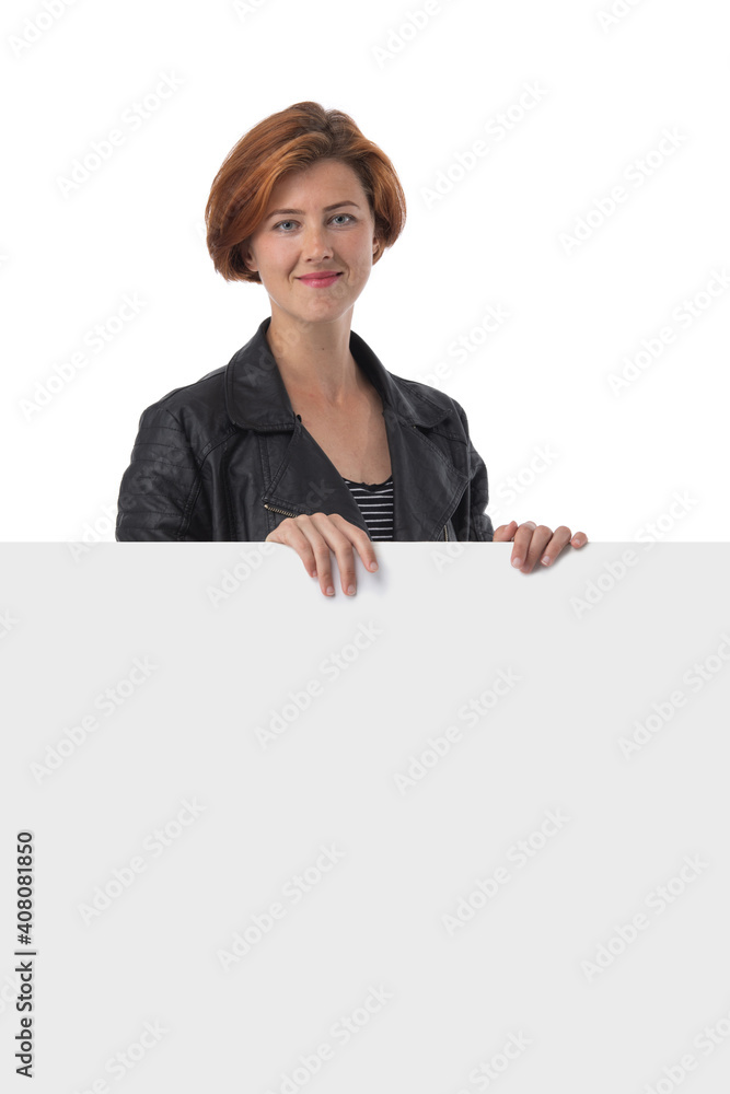 Redhead woman holding white sign Redhead woman holding white sign