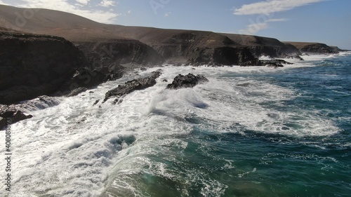 The sea hits the cliffs