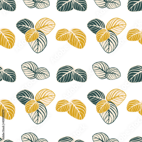Seamless pattern of yellow and green leaves on a white background. Autumn template for printing on textiles, fabric, bedding, wrapping paper, covers, wallpaper.  © Sagittarius_13