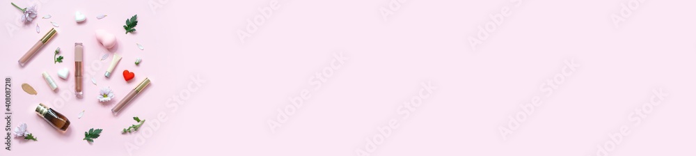 Spring banner with cosmetics and flowers on a pink background. Cosmetic products on pink background. Set of luxury decorative cosmetics flat lay. Spring banner with cosmetics and flowers on a pink background. Cosmetic products on pink background. Set of luxury decorative cosmetics flat lay.