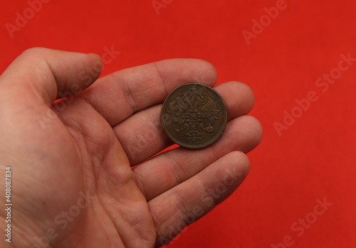 Vintage russian copper coin in hand