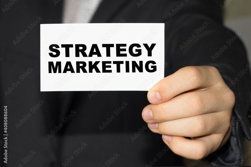 Card with text STRATEGY MARKETING on hand. You can use in business, marketing and other concepts. Messege of the day. Card with text STRATEGY MARKETING on hand. You can use in business, marketing and other concepts. Messege of the day.