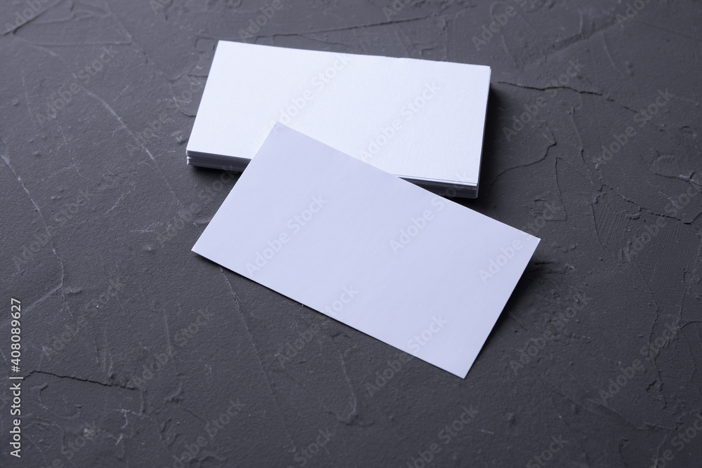 Business card blank on beton rock background. Corporate Stationery, Branding Mock-up. Creative designer desk. Flat lay. Copy space for text. Template for ID. Business card blank on beton rock background. Corporate Stationery, Branding Mock-up. Creative designer desk. Flat lay. Copy space for text. Template for ID.