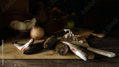 Fresh fish on a wooden table.