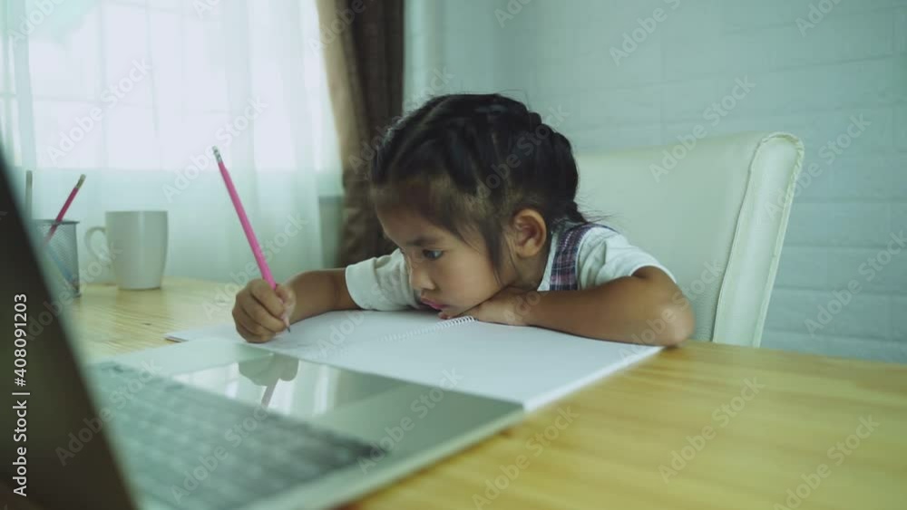 Asian cute girl student online learning class study online with laptop at home. Asian cute girl student online learning class study online with laptop at home.