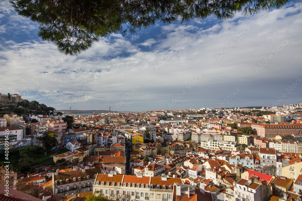 Lisbon, Portugal, 2017 : Tourists at the viewpoint Miradouro da Graca look at the Lisbon overview.
Viewpoint Miradoura Da Graca - one of the best in the city and very popular among tourists.
