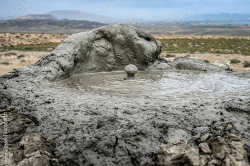 Mud volcano erupting. Gobustan (Qobustan), Azerbaijan. photo