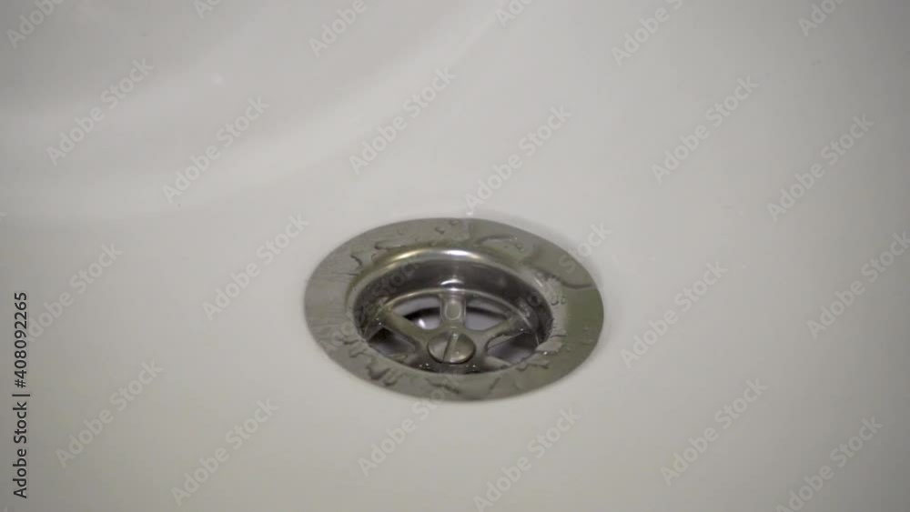 water drips into the sink,Drops Of Water Drip Into The Sink water drips into the sink,Drops Of Water Drip Into The Sink