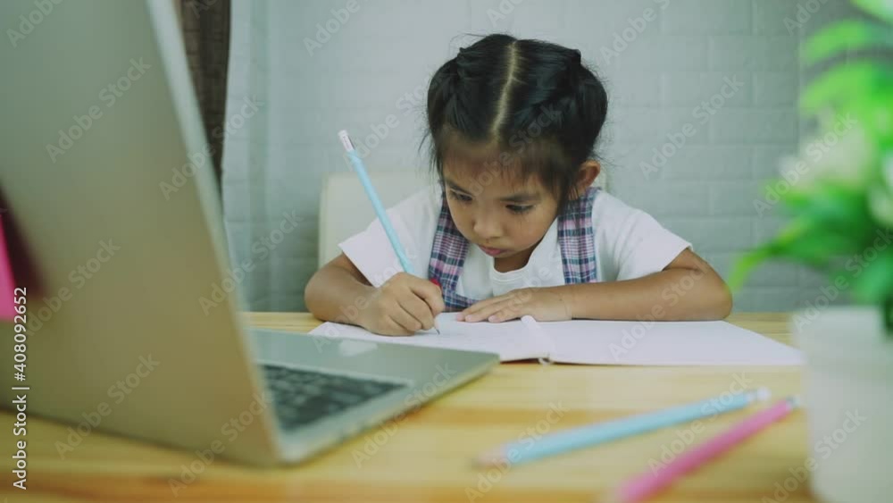 Asian cute girl student online learning class study online with laptop at home. Asian cute girl student online learning class study online with laptop at home.