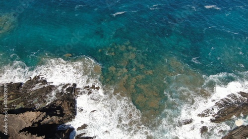 The sea hits the cliffs