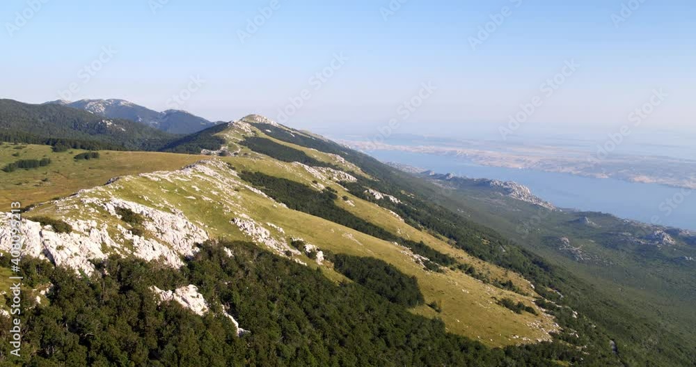 Aerial scene of Velebit Mountain and the Adriatic Sea in the background, Croatia Aerial scene of Velebit Mountain and the Adriatic Sea in the background, Croatia