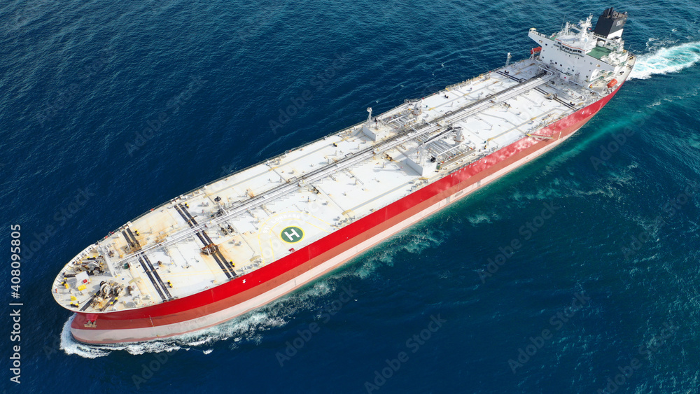 Aerial drone top down photo of latest technology in safety standards crude oil tanker cruising open ocean deep blue sea
